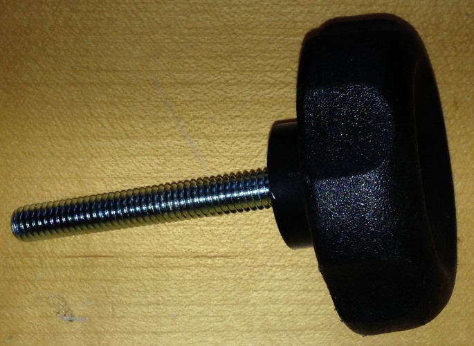 The Louisville Slugger Ultimate pitching machine replacement part known as  the Nylon Support Block with Knob.